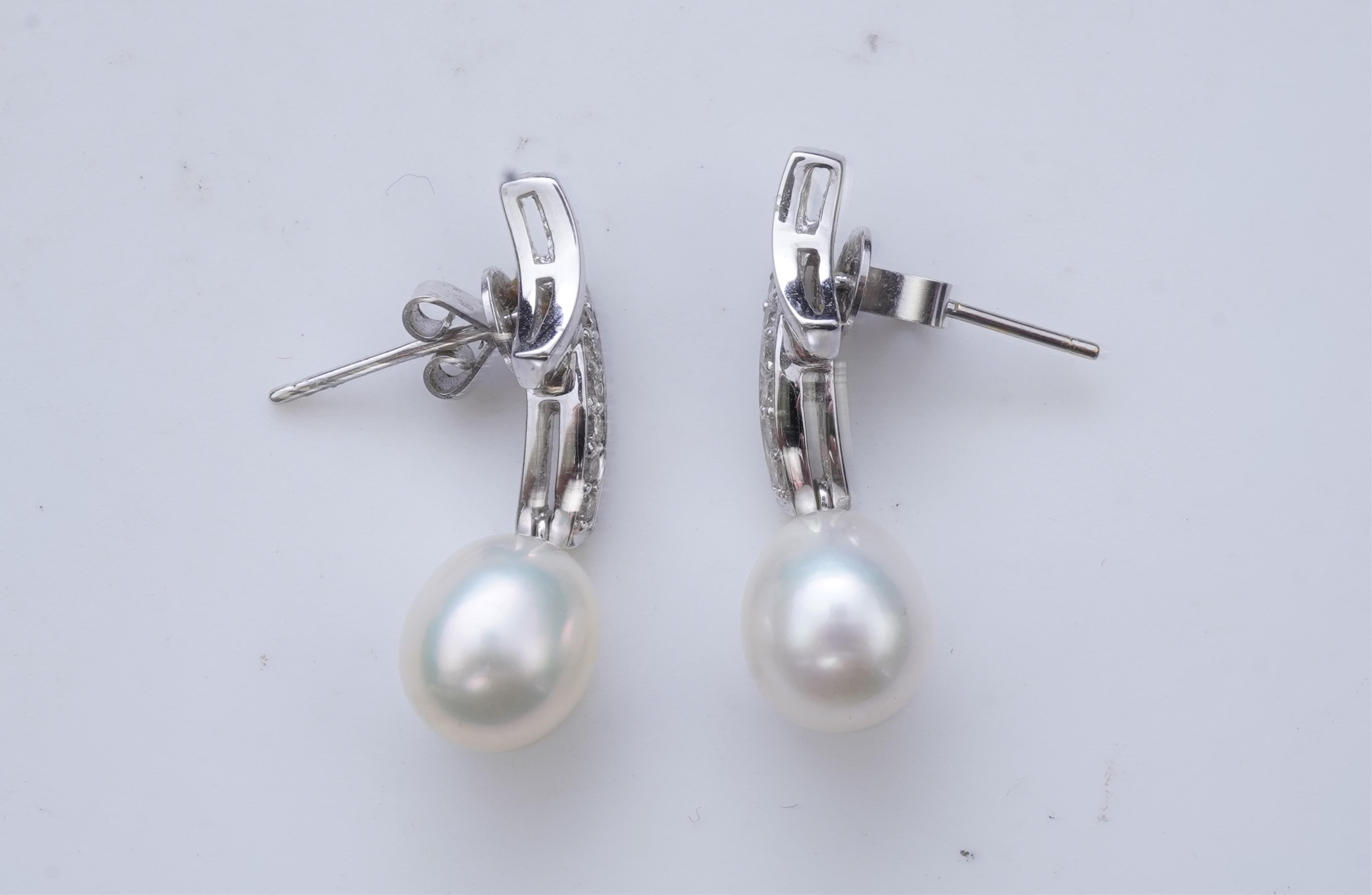 A cultured pearl and diamond demi-parure